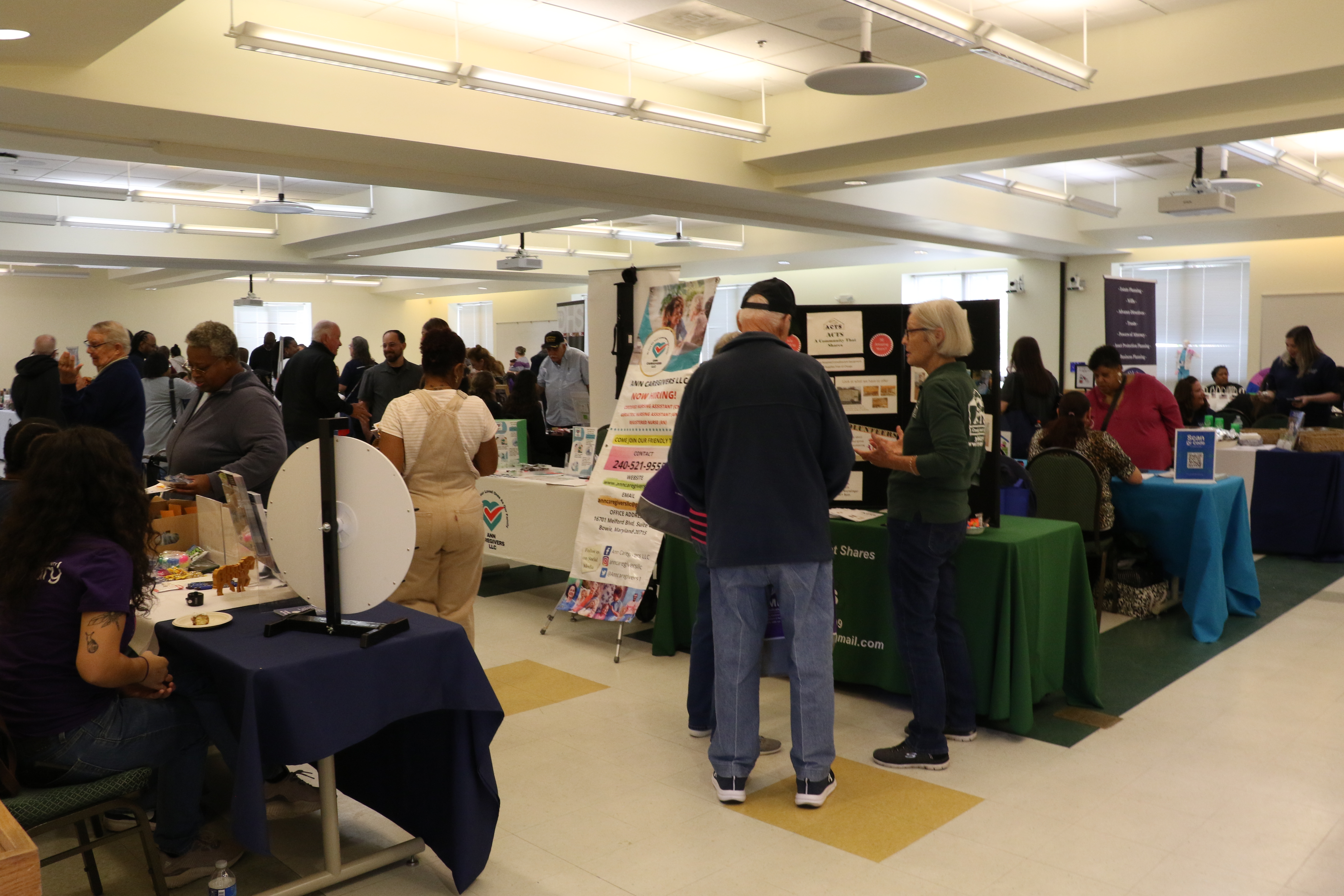 Numerous people enjoying the Health Fair